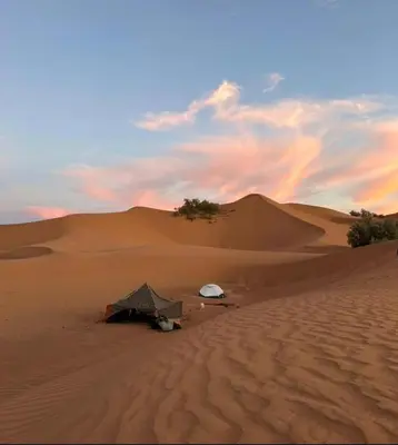 a tent in the middle of a desert at Casa de las Estrellas in Mhamid