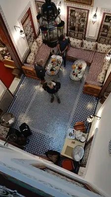 an overhead view of a living room with a floor at Riad Dar Mama Laila in Fès