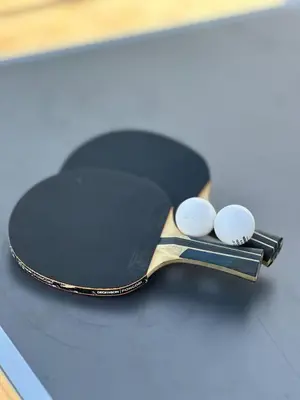 a black and gold spatula sitting on top of a table at Villa SUNSET Marrakech in Marrakech