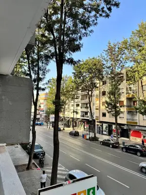 a view of a city street with cars and buildings at Appartement Rabat Agdal in Oulad Akkou