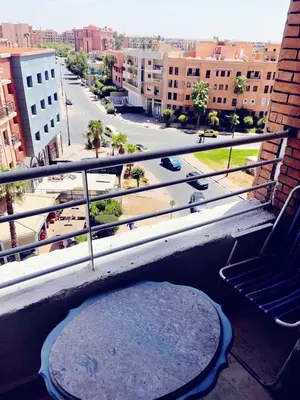 a view of a city from a balcony at Bel appartement 2 chambres au cœur de Marrakech in Oulad Akkou