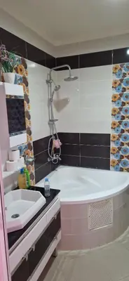 a bathroom with a tub and a sink at Villa in Meknès