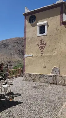 a building with a window on the side of it at Gite ditabe tafoukte