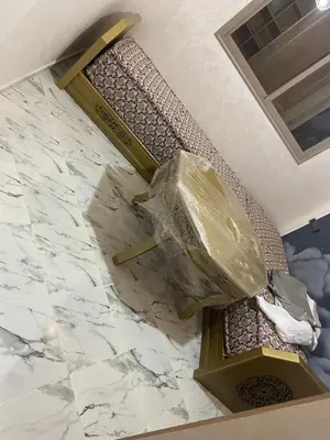 a room with a marble floor with a machine at Al bassatine in Meknès