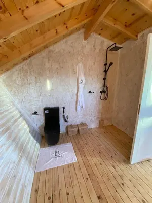 an attic room with a wall with a mannequin on it at La Pointe d'Or Dakhla in Oulad Akkou
