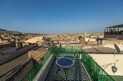 a view of a city from the top of a building at Dar El Kendil in Fès