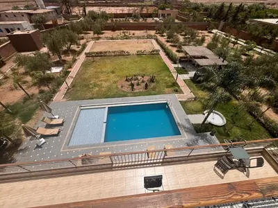 an overhead view of a swimming pool in a yard at Luxury family villa with private pool in Douar bel Rhanodour