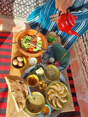 a table topped with plates of food on a table at Auberge chez hammadi
