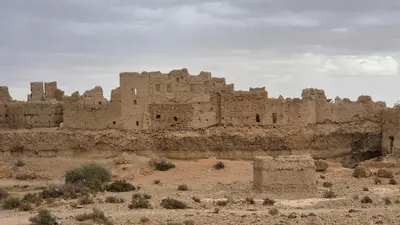 an old building in the middle of the desert at Dartagounite in Oulad Akkou