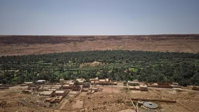 an aerial view of a village in the desert at Dartagounite in Oulad Akkou