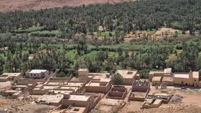 an aerial view of a village in the desert at Dartagounite in Oulad Akkou