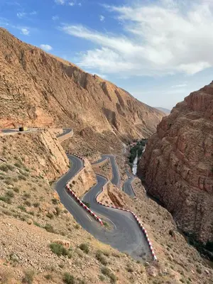 a winding road on the side of a mountain at Riad Dades Birds Lodge in Boumalne