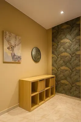 a room with a shelf and a painting on the wall at Relax Family 12 - Cozy Entire Apartment in City Center in Ouarzazate