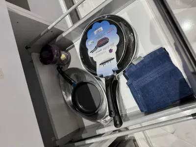 a metal utensil sitting on top of a shelf at Calm Elegant Apartment City Center with Garage in Fès