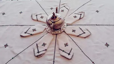 a close up of a flower on a blanket at Kasabah Senhaji in Moulay Idriss Zerhoun