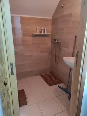 a bathroom with a shower and a sink at rdc surélevé neuf a 10 min du centre ville in Fès