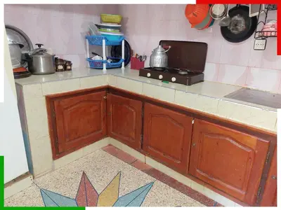 a kitchen with a counter top with a stove at Spacious apartment for families near Ouzoud Falls in Azilal