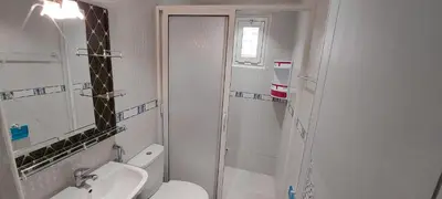 a bathroom with a toilet and a sink and a shower at Andalucia in Fès