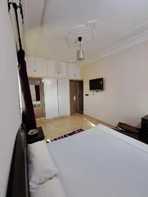 a room with a white room with a ceiling at Villa HACHIMI in Erfoud
