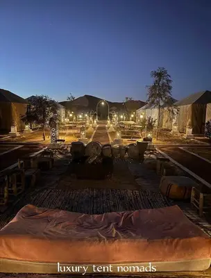 a view of a desert at night at Luxury tent nomads in Merzouga