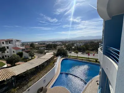 a view of a swimming pool from a building at Studio Appart hotel in Oulad Akkou