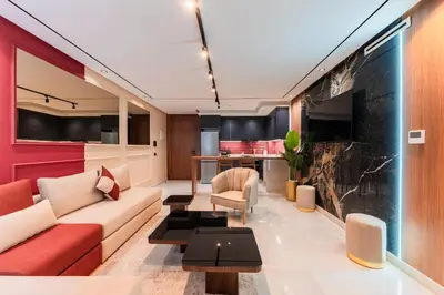 a living room with a couch and a table at Luxury Suite des Princesses in Oulad Akkou
