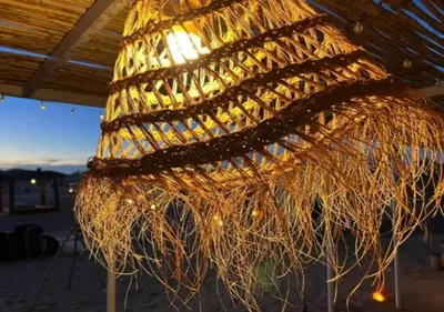 a chandelier made out of rope and nets at Camp Lovers Desert in Merzouga