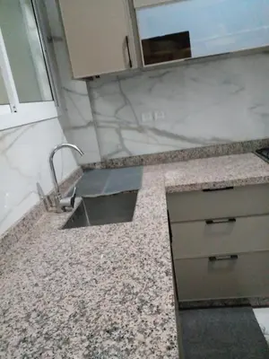 a kitchen with a sink and a counter top at Casa Miriam fes in Fès