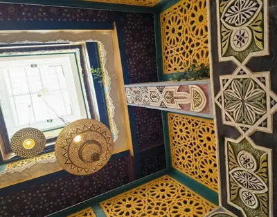 a room with many different types of art on the wall at Riad Dalia - Fes Medina in Fès