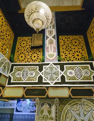 a chandelier hanging from the ceiling of a building at Riad Dalia - Fes Medina in Fès