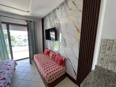 a couch with red pillows in a room at BEST DREAM Spot in Oulad Akkou