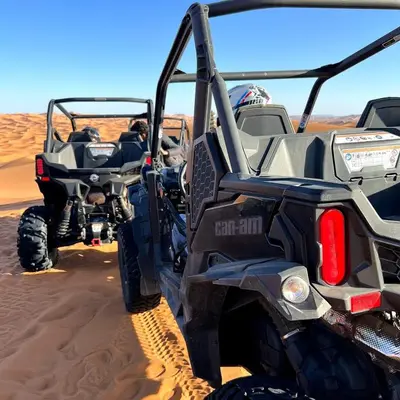 an atv in the sand in the desert at Sahara Moon Luxury Camp in Merzouga
