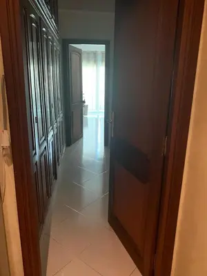 a hallway with an open door to a room at Tessas Crib in Fès