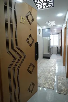 a door in an office with the number thirteen on it at APPARTEMENT AMJAD iFRANE in Ifrane