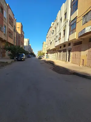 an empty street in a city with buildings at appartement chic, calme et bien équipé in Meknès