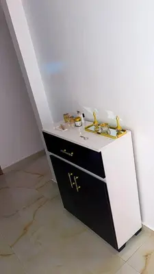 a bathroom with a white counter and a sink at Premium village marrakech in Ville Nouvelle