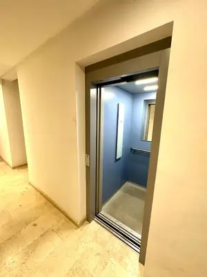 an empty room with a glass door in a building at Garden View- Gueliz-Majorelle appartement 2 chambres- Wifi et piscines in Oulad Akkou