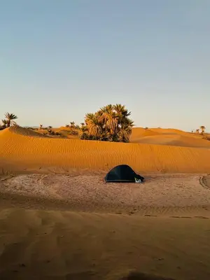 a tent in the middle of a desert at Dar Chez Ali in Mhamid