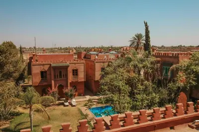 an aerial view of a house with a swimming pool at Villa Riad Soles Heated pool Luxury and Beauty in Douar Soukkane