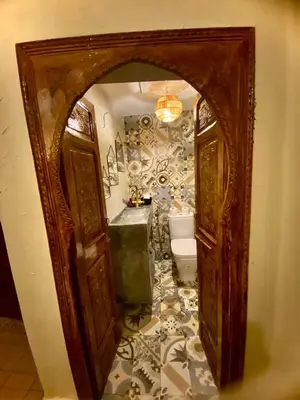 a bathroom with a sink and a toilet at Riad Oum h&N in Srarhna