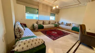a large living room with couches in a room at Prestigia Luxury Apartments Fes in Fès