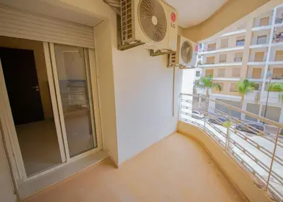 a balcony with a view of a building at Prestigia Luxury Apartments Fes in Fès
