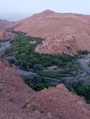 an aerial view of a village on a mountain at Auberge le calme restaurante in Bou Tharar