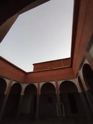 a view of the ceiling of a building at Auberge le calme restaurante in Bou Tharar