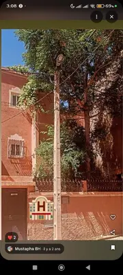 a screenshot of a picture of a tall building at Dar sonic in Ouarzazate