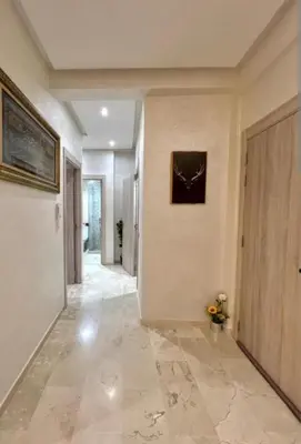 a hallway of a home with a painting on the wall at slimane in Aït Hallouane