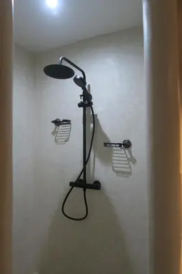 a shower in a bathroom with a shower at Tigmi N'Dounit Lodge et Nature in Boumalne