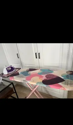 a room with a bed with a colorful rug on it at Mandela in Oulad Akkou