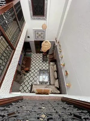 a view from the top of a building with a floor at Dar Bab Boujloud Fez in Fès