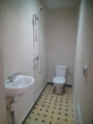 a bathroom with a sink and a toilet and a shower at Studio la petite Campagne Belgium Camp 50 km Near Marrakesh